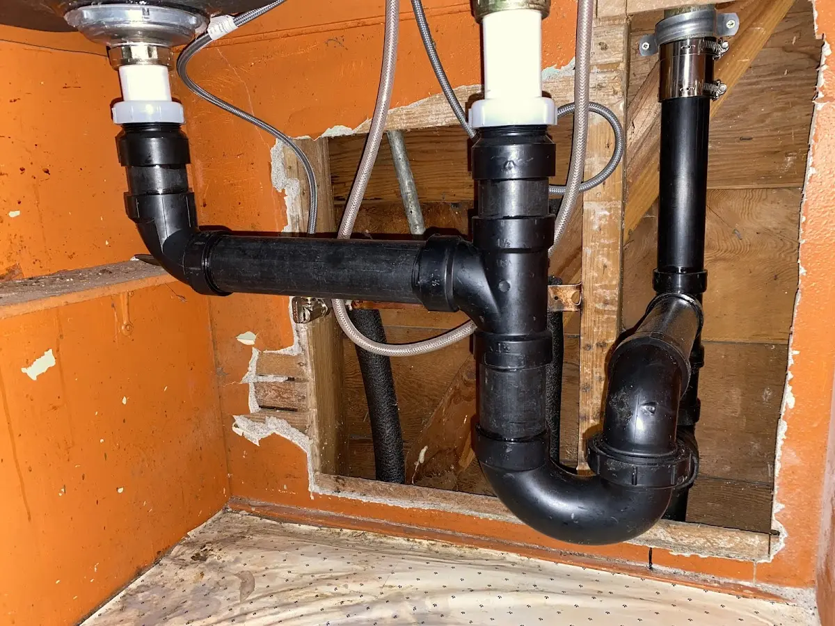 Professional Garbage Disposal Repair equipment and tools on the job in Durango